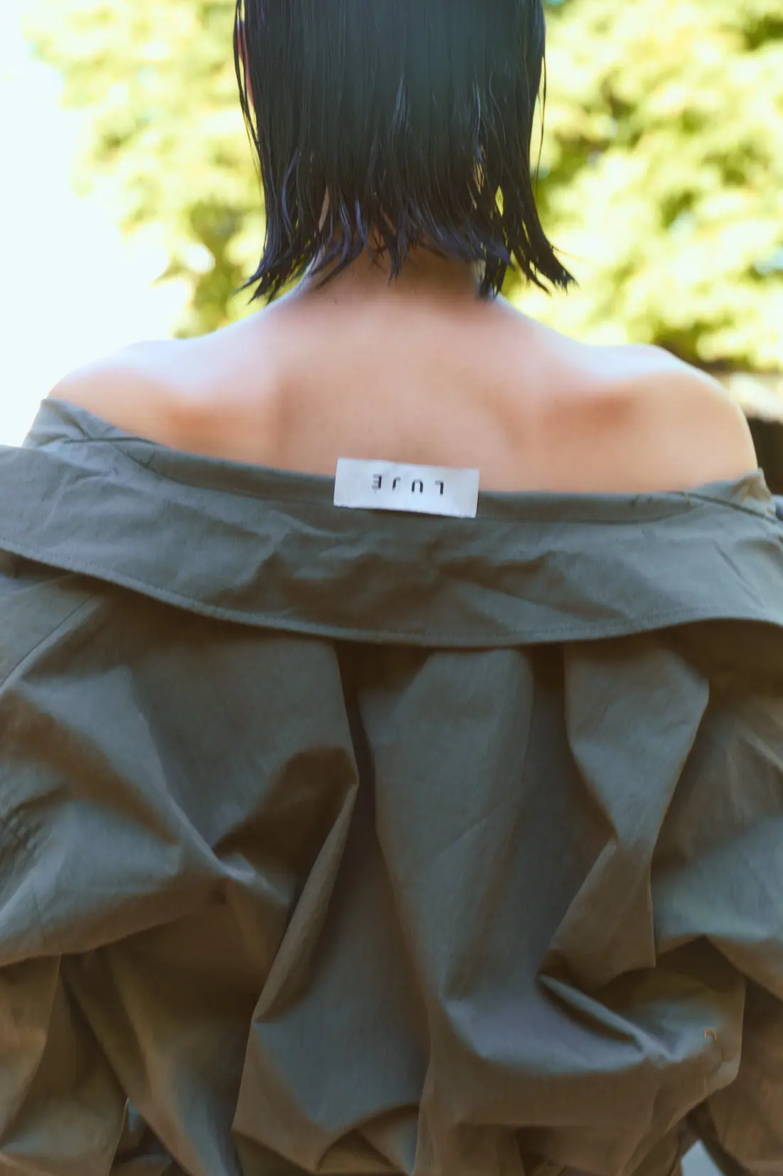 A detail of softly worn tailoring.
